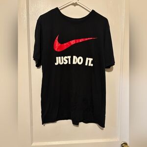 Nike Men's Black Tee with Red Swoosh